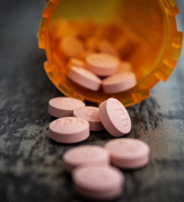 A close-up of a pill bottle
